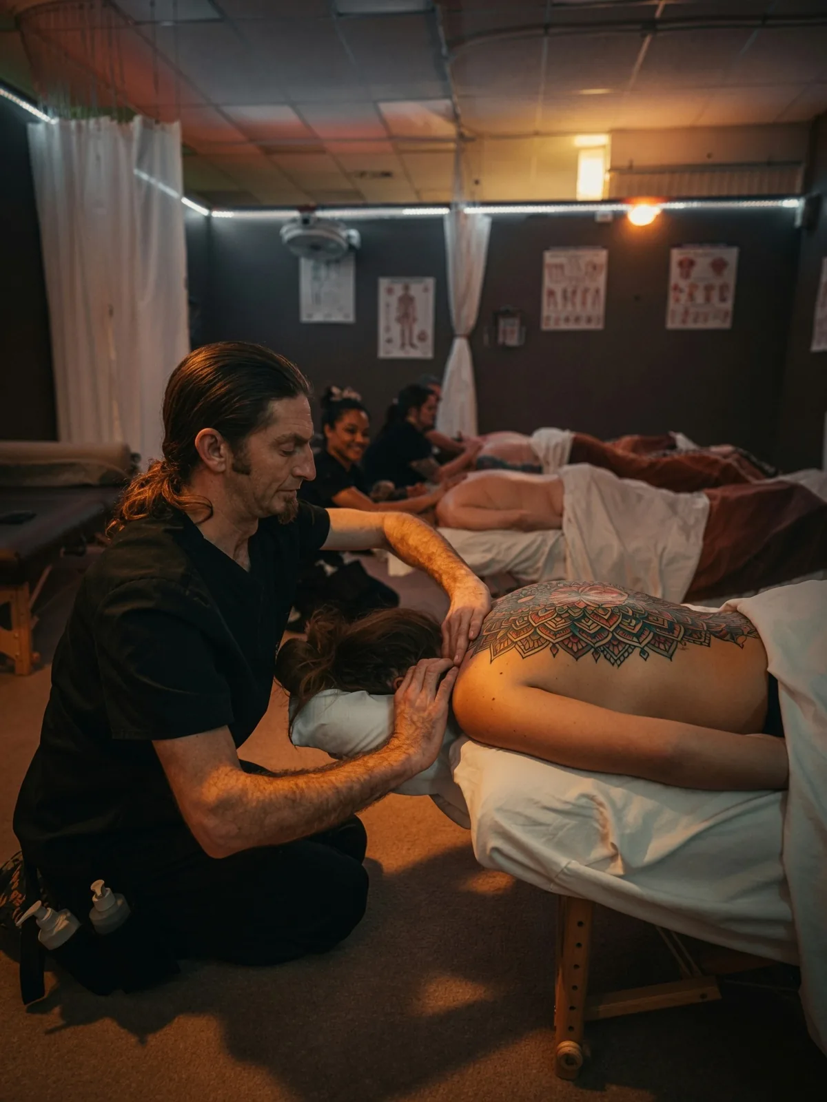Group massage class at the Brownwood campus — Texas Massage Academy, Brownwood TX