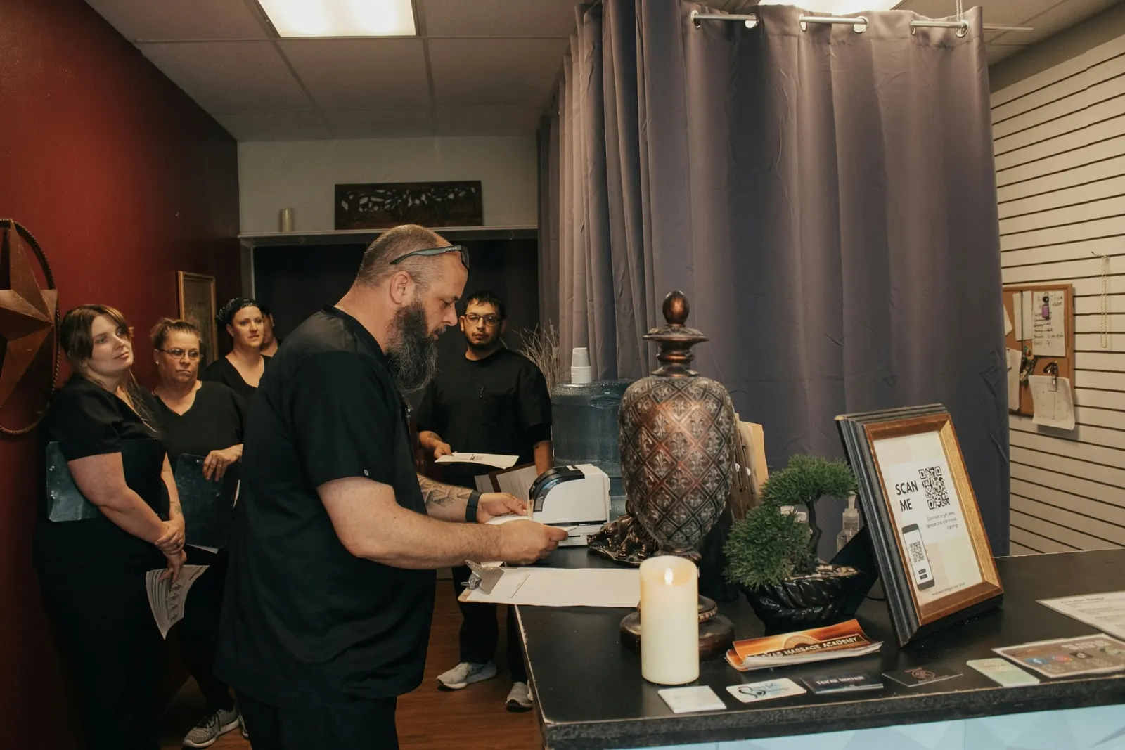 Students checking in at the student clinic front desk — Texas Massage Academy, Brownwood TX