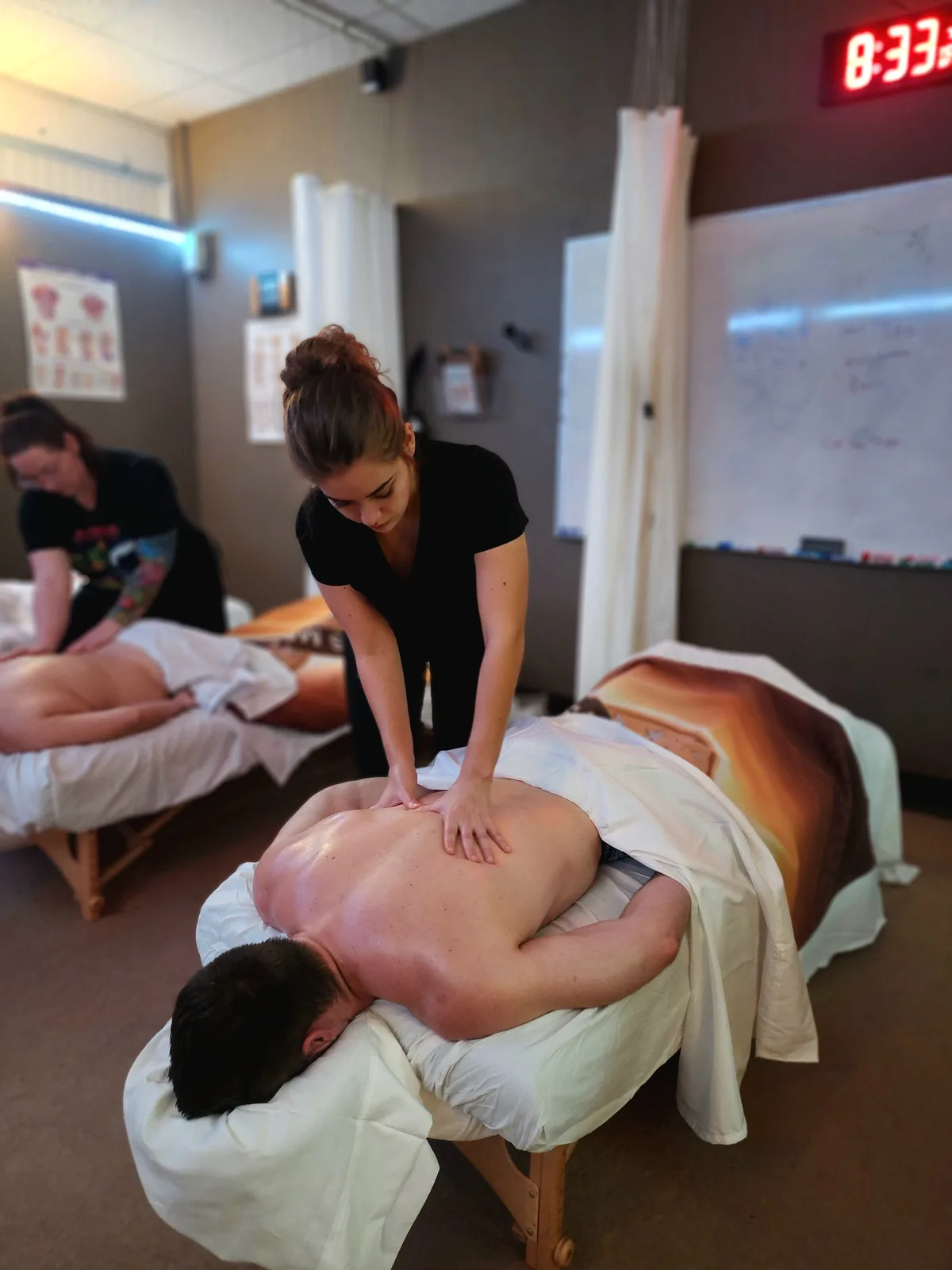 Female student giving a relaxation massage — Texas Massage Academy, Brownwood TX