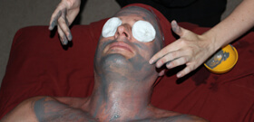 Students getting facials in massage school